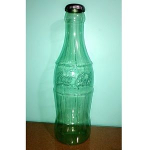 Huge Coca-Cola bottle coin bank